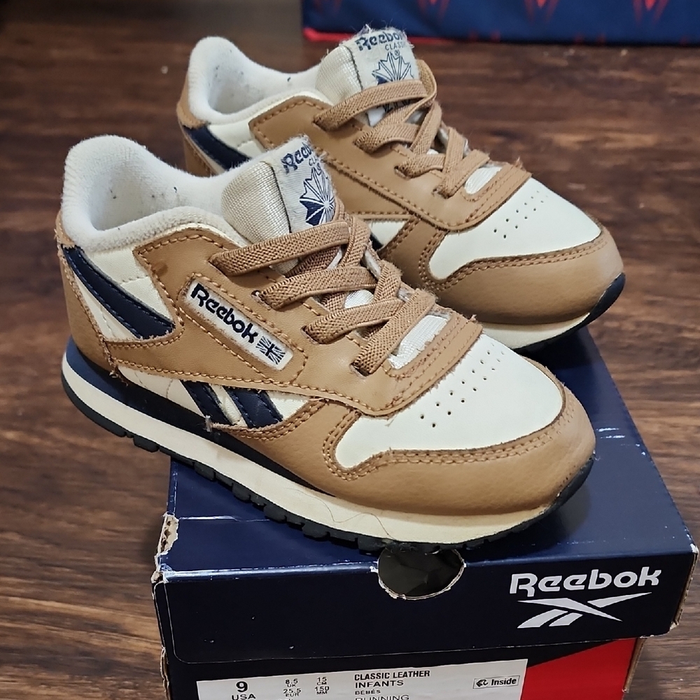 Toddler Reebok Classic Tan Retro Sneakers with Cream Panels and Navy Stripe.